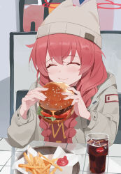 1girl ^_^ absurdres animal_ear_headwear beanie blue_archive blush braid brown_hat brown_jacket burger chinese_commentary closed_eyes closed_mouth commentary cup drinking_glass eating facing_viewer fake_animal_ears fanshuimucishen fast_food food french_fries hair_between_eyes halo hat highres holding holding_burger holding_food hood hood_down hooded_jacket ice ice_cube indoors jacket ketchup long_hair long_sleeves maki_(blue_archive) maki_(camp)_(blue_archive) official_alternate_costume official_alternate_hairstyle open_clothes open_jacket plate red_hair red_halo red_shirt reflective_table shirt sidelocks smile soda solo table twin_braids