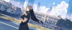 1girl animal black_eyes black_hair black_skirt blue_sky building cat caution_tape closed_mouth cloud commentary_request halo highres holding holding_animal kurohal long_hair looking_at_viewer original outdoors playground reflection scenery school_uniform skirt sky skyscraper solo standing tree water