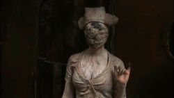 1girl animated animated_gif breasts bubble_head_nurse cleavage cosplay nurse nurse_(silent_hill) nurse_(silent_hill)_(cosplay) silent_hill silent_hill_(movie) silent_hill_(series)