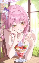 1girl bare_arms blue_archive blush collarbone commentary dawon dress eating fingernails food hair_bun halo hand_on_own_cheek hand_on_own_face head_rest highres holding holding_spoon indoors long_sleeves mika_(blue_archive) parfait pink_hair single_side_bun sitting sleeveless sleeveless_dress solo spoon upper_body white_dress