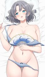 1girl areola_slip artist_name averting_eyes blue_eyes bra breasts collarbone commentary_request folding_fan grey_hair groin hand_fan hand_up head_on_pillow highres holding holding_fan large_breasts looking_to_the_side lying navel on_back open_mouth panties parted_bangs pillow polka_dot polka_dot_bra polka_dot_panties senran_kagura solo surippa1010 teeth thigh_gap thighs twitter_username underwear underwear_only upper_teeth_only yumi_(senran_kagura)