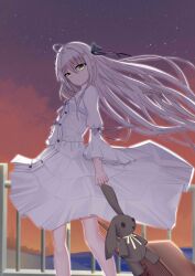 Rule 34 | 1girl, ahoge, arm at side, backlighting, black ribbon, bow, brown hair, buttons, closed mouth, commentary request, dress, dress bow, eyes visible through hair, feet out of frame, film grain, floating clothes, floating hair, grey bow, hair between eyes, hair intakes, hair ribbon, highres, holding, holding stuffed toy, kasugano sakura, long hair, long sleeves, looking at viewer, mamiya yuki, outdoors, pleated dress, ribbon, sidelocks, sleeve bow, solo, standing, stuffed animal, stuffed rabbit, stuffed toy, sunset, two side up, very long hair, white dress, wide sleeves, wind, yellow eyes, yosuga no sora