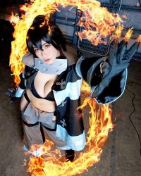 1girl black_bra bra breasts cosplay en&#039;en_no_shouboutai female_focus fire highres large_breasts long_hair looking_at_viewer model partially_undressed photo_(medium) shibuya_kaho smile solo tamaki_kotatsu tamaki_kotatsu_(cosplay) twintails underwear wig