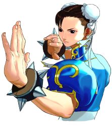 1girl bracelet brown_eyes bun_cover capcom china_dress chinese_clothes chun-li double_bun dress earrings fighting_stance foreshortening hair_bun highres ikeno_daigo jewelry official_art sash solo spiked_bracelet spikes street_fighter street_fighter_iii_(series) studded_bracelet