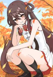 1girl absurdres alternate_costume autumn autumn_leaves bare_shoulders black_socks blue_sky blush brown_hair day dress flower flower-shaped_pupils full_body genshin_impact grin hair_between_eyes hair_flower hair_ornament hairclip_(user_rasc5457) highres holding hu_tao_(cherries_snow-laden)_(genshin_impact) hu_tao_(genshin_impact) leaf loafers long_hair looking_at_viewer outdoors panties pantyshot red_eyes shoes sidelocks sky sleeveless sleeveless_dress smile socks solo squatting symbol-shaped_pupils thighs tree twintails underwear unworn_eyewear very_long_hair white_dress white_panties