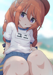 Rule 34 | 1girl, asymmetrical bangs, blue pants, blue ribbon, blush, braid, character name, eyelashes, gym uniform, hair between eyes, hat, knees, looking at viewer, open mouth, outdoors, pants, princess connect!, purple eyes, red hair, ribbon, sailor collar, school uniform, shirt, short sleeves, simple background, sitting, solo, twin braids, umarutsufuri, white shirt, yuni (princess connect!)