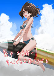 1girl akiyama_yukari barefoot bikini blue_bikini blue_sky breasts brown_eyes brown_hair cloud cloudy_sky day girls_und_panzer highres looking_at_viewer medium_breasts messy_hair navel open_mouth outdoors oversized_object riding shochuumimai short_hair side-tie_bikini_bottom sky smile solo swimsuit tank_shell translated wind yamano_rita
