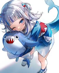 1girl blue_eyes blue_streaks closed_mouth commentary fins fish_tail gawr_gura gawr_gura_(1st_costume) grey_hair highres holding holding_stuffed_toy hololive hololive_english looking_at_viewer one_eye_closed shark_girl shark_tail smile solo standing stuffed_toy tail tsugutoku two_side_up virtual_youtuber