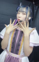 Rule 34 | 1girl, blue hair, dress, flat chest, indoors, japanese (nationality), kobayashi aika, looking at viewer, microphone, nail polish, official alternate costume, photo (medium), purple eyes, real life, standing, voice actor