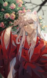 1boy animal_ears bead_necklace beads closed_mouth dog_boy dog_ears fingernails flower hair_between_eyes highres inuyasha inuyasha_(character) japanese_clothes jewelry long_fingernails long_hair looking_at_viewer male_focus necklace pink_flower pink_rose red_shirt rose sharp_fingernails shirt sidelocks smile solo tooth_necklace upper_body white_hair wide_sleeves xue_ezi yellow_eyes