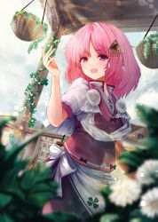 1girl :d apron blurry blurry_foreground blush cowboy_shot day flower flower_basket glint hair_ornament hand_up hanging_plant highres lens_flare light_particles mansion medium_hair open_mouth outdoors pink_eyes pink_hair puffy_short_sleeves puffy_sleeves purple_vest sara_(touhou) shirt short_sleeves smile solo standing teruteru12 touhou touhou_(pc-98) vest waist_apron white_apron white_flower white_shirt