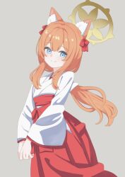 1girl animal_ears blue_archive blue_eyes cat_ears floating_hair grey_background hair_between_eyes hair_ribbon hakama hakama_skirt halo head_tilt highres japanese_clothes la_mer_ao light_smile looking_at_viewer mari_(blue_archive) miko orange_hair own_hands_together red_ribbon ribbon sidelocks skirt