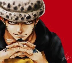 1boy chiyo_(@ch_falgar) closed_mouth earrings facial_hair goatee hand_tattoo hat head_rest highres hood hoodie interlocked_fingers jewelry looking_at_viewer male_focus one_piece red_background sideburns signature simple_background smile solo tattoo trafalgar_law upper_body yellow_eyes