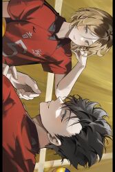 2boys absurdres ball bishounen black_hair blonde_hair brown_eyes brown_hair closed_mouth collared_shirt commentary haikyuu!! hand_up highres holding holding_ball kozume_kenma kuroo_tetsurou looking_at_viewer multicolored_hair multiple_boys myanya parted_bangs red_shirt roots_(hair) shirt short_sleeves sideways spiked_hair sportswear sweat upper_body volleyball_(object) volleyball_uniform wing_collar