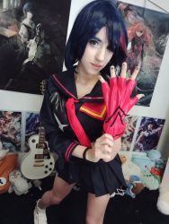 1girl blue_hair cosplay female_focus kill_la_kill lana_rain manyvids matoi_ryuuko matoi_ryuuko_(cosplay) multicolored_hair mv_productions photo_(medium) school_uniform self-upload short_hair solo streaked_hair suspenders
