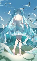 1girl absurdres animal aqua_hair barefoot beach bird blue_sky buri_(retty9349) commentary from_behind full_body hatsune_miku highres long_hair ocean outdoors seagull skirt_hold sky standing twintails very_long_hair vocaloid water_dress waves