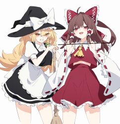 2girls absurdres apron ascot black_dress black_hat blonde_hair blush bow braid broom brown_hair detached_sleeves diieru dress gohei green_bow grin hair_between_eyes hair_bow hakurei_reimu hat highres holding holding_broom holding_gohei huge_bow japanese_clothes kimono kirisame_marisa long_hair looking_at_viewer multiple_girls open_mouth red_bow red_eyes red_kimono red_skirt short_sleeves sidelocks single_braid skirt smile teeth touhou upper_teeth_only white_apron white_sleeves wide_sleeves witch witch_hat yellow_ascot yellow_eyes