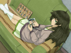 1girl black_hair book breasts charm_(object) couch dutch_angle feet female_focus green_eyes highres hiyajou_maho jacket kiryuu_moeka long_hair long_sleeves looking_at_viewer manga_(object) menomorute meta no_shoes okabe_rintarou shirt sitting small_breasts socks solo steins;gate steins;gate_0 tennouji_nae thick_eyebrows white_footwear