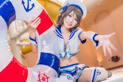 Rule 34 | 1girl, blue eyes, blurry, blurry background, cosplay, cosplay photo, costume, grey hair, hat, indoors, japanese (nationality), kneeling, looking at viewer, love live!, love live! sunshine!!, mi yan 0728, open clothes, photo (medium), short hair, skirt, solo, swim ring, thighhighs, watanabe you