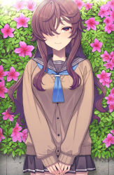 1girl android_girl_(itou) black_sailor_collar black_skirt blue_neckerchief brown_cardigan brown_hair cardigan closed_mouth commentary flower hair_over_one_eye highres itou_(onsoku_tassha) long_hair looking_at_viewer neckerchief original own_hands_together pink_flower pleated_skirt sailor_collar school_uniform skirt smile solo straight-on symbol-only_commentary vegetation