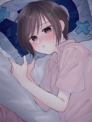 1girl absurdres baby_(demotsu) bed_sheet blush brown_eyes brown_hair closed_mouth embarrassed fruits_basket hands_up highres looking_at_viewer lying no on_bed on_side pillow pout short_hair short_sleeves solo sohma_akito upper_body yes-no_pillow