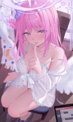 1girl absurdres babydoll bare_legs blue_archive breasts cellphone_photo cleavage collarbone feathered_wings finger_to_mouth fingernails hair_bun halo highres indoors looking_at_viewer medium_breasts mika_(blue_archive) oyaji_hime pink_hair shushing single_side_bun sitting solo strap_slip white_babydoll white_wings wings