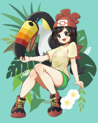 1girl beanie bird brown_hair commentary_request floral_print flower gen_7_pokemon green_background green_eyes green_shorts hat highres knees knees_together_feet_apart leaf medium_hair moegi_itsukashi nintendo open_mouth pokemon pokemon_(creature) pokemon_sm red_hat selene_(pokemon) shirt shoes short_shorts short_sleeves shorts smile t-shirt tied_shirt tongue toucannon white_flower yellow_shirt