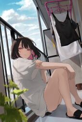 1girl absurdres black_hair black_shorts blurry blurry_background closed_mouth clothes_hanger cloud colored_inner_hair commentary_request dolphin_shorts hamunezuko_(nezukonezu32) highres holding_own_arm knees_up looking_to_the_side multicolored_hair original outdoors oversized_clothes oversized_shirt pink_eyes pink_hair plant railing shirt short_hair shorts sitting sky slippers solo t-shirt unworn_clothes white_shirt