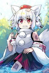 1girl absurdres animal_ear_fluff animal_ears black_skirt blush clenched_teeth commentary detached_sleeves grimace hair_between_eyes hat highres holding in_water inubashiri_momiji medium_hair miniskirt nature ofuda ofuda_on_head pokopoko_ponzu pom_pom_(clothes) red_eyes red_hat red_ribbon ribbon ribbon-trimmed_sleeves ribbon_trim shirt skirt skirt_hold sleeveless sleeveless_shirt solo tail teeth tengu tokin_hat touhou tree wading water white_hair white_shirt white_sleeves wolf_ears wolf_girl wolf_tail