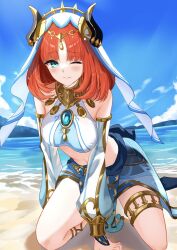 beach blue_eyes blue_skirt blunt_bangs blush breasts closed_mouth crop_top dancer detached_sleeves fake_horns genshin_impact gold_thighlet harem_outfit highres horns large_breasts leaning_forward long_hair long_sleeves looking_at_viewer navel nilou_(genshin_impact) one_eye_closed red_hair sand skirt smile thighs veil white_veil yattorusen