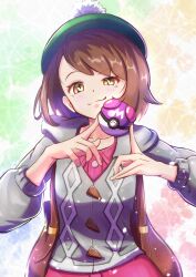 1girl backpack bag blush brown_bag brown_hair buttons cardigan closed_mouth collared_dress commentary_request dress eyelashes gloria_(pokemon) green_hat grey_cardigan h_knight_37 hands_up hat highres holding holding_poke_ball hood hooded_cardigan master_ball medium_hair nintendo pink_dress poke_ball pokemon pokemon_swsh smile smug solo tam_o&#039;_shanter
