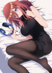bare_arms bare_shoulders bed_sheet black_pantyhose black_sweater blue_eyes blush breasts closed_mouth commentary dress go-toubun_no_hanayome hair_between_eyes headphones highres holding holding_headphones large_breasts long_hair long_hair_between_eyes looking_at_viewer lying nakano_miku nishizuki_shino on_back pantyhose red_hair ribbed_sweater sleeveless sleeveless_sweater sleeveless_turtleneck sweater sweater_dress thighs turtleneck turtleneck_sweater unworn_headphones