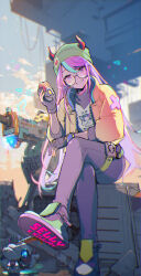 !? 1girl animal_print beanie blue_hair blush cat_print commentary_request cosplay crazy_raccoon explosive glasses gloves green_hat grenade grey_gloves grin hat highres holding holding_grenade horns horns_through_headwear jacket killjoy_(valorant) killjoy_(valorant)_(cosplay) looking_at_viewer making-of_available multicolored_hair open_clothes open_jacket pants partially_fingerless_gloves pink_hair purple_eyes round_eyewear sai_(saiqun_31) selly55 shoe_soles sitting smile soles solo streaked_hair text_print two-tone_hair valorant yellow_jacket