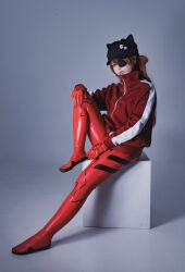 1girl bodysuit casual cosplay eyepatch formal_clothes glico_happy hat highres jacket looking_at_viewer neon_genesis_evangelion photo_(medium) pin rebuild_of_evangelion red_suit sitting souryuu_asuka_langley souryuu_asuka_langley_(cosplay) suit