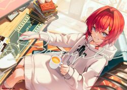 1girl ange_katrina book computer_keyboard computer_mouse cup hair_between_eyes hair_ornament holding holding_cup hood hood_down hoodie indoors kagawa_ichigo long_sleeves looking_at_viewer nijisanji official_art on_chair parted_lips red_hair sample_watermark short_hair sitting smile socks solo table virtual_youtuber watermark white_hoodie white_socks