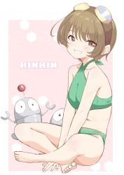 1girl barefoot bikini breasts brown_eyes brown_hair character_name commentary_request full_body goggles goggles_on_head green_bikini grin halterneck highres indian_style medium_breasts pink_background rinrin_(sister_princess) robot short_hair siomaru16 sister_princess sitting smile swimsuit
