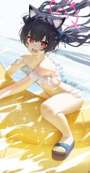1girl absurdres adapted_costume animal_ear_fluff animal_ears banana_boat bare_shoulders bikini black_hair blue_archive cat_ears cat_girl extra_ears fang floating_hair frilled_bikini frills halo halterneck highres long_hair looking_at_viewer ocean open_mouth outdoors red_eyes red_halo sandals see-through_bikini see-through_clothes serika_(blue_archive) serika_(swimsuit)_(blue_archive) skin_fang slit_pupils solo songchuan_li sparkle swimsuit thighs toenails toes twintails water