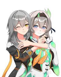 absurdres black_jacket blush bridal_gauntlets closed_mouth cropped_jacket ejpytr firefly_(honkai:_star_rail) gradient_eyes green_pupils grey_hair hair_between_eyes hair_intakes hair_ornament hair_ribbon hairband highres honkai:_star_rail honkai_(series) hug hug_from_behind jacket multicolored_eyes neckerchief one_eye_closed orange_neckerchief ribbon single_bridal_gauntlet smile stelle_(honkai:_star_rail) trailblazer_(honkai:_star_rail) two-tone_eyes yellow_eyes