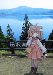 1girl ahoge animal_ear_fluff animal_ears bag blue_sky blush brown_eyes brown_hair brown_shoes brown_skirt cat_ears cat_girl cat_tail cherry_hair_ornament closed_mouth collared_shirt commentary day food-themed_hair_ornament hair_ornament hairclip hand_up high-waist_skirt highres lake loafers long_hair long_sleeves looking_at_viewer mountain nakkar one_eye_closed original outdoors photo_background pink_skirt plaid_clothes plaid_skirt pleated_skirt puffy_long_sleeves puffy_sleeves shirt shoes shoulder_bag sign skirt sky sleeves_past_wrists socks solo standing symbol-only_commentary tail translation_request tree twintails twitter_username v white_shirt white_socks