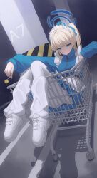 1girl apron blonde_hair blue_archive blue_eyes blue_halo blue_jacket blue_skirt bow breasts candy food halo highres holding holding_candy holding_food holding_lollipop in_shopping_cart jacket lollipop long_hair long_sleeves loose_socks maid_apron maid_headdress maji_(majidesu3) shoes shopping_cart skirt sneakers socks solo toki_(blue_archive) twintails white_apron white_shoes white_socks