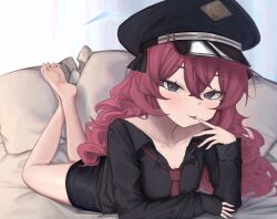 1girl ahiru_(ahahahahiru) bare_legs barefoot black_hat black_shirt black_skirt blue_archive blue_eyes blue_halo blush collarbone crossed_bangs feet finger_to_mouth fingernails fluffy_hair hair_between_eyes half-closed_eyes halo hand_up hat highres iroha_(blue_archive) licking_finger loli long_hair long_sleeves looking_at_viewer loose_necktie lying necktie off_shoulder on_stomach peaked_cap pillow red_hair red_necktie shirt skirt sleeves_past_wrists soles solo the_pose thighs toes tongue tongue_out very_long_hair wavy_hair