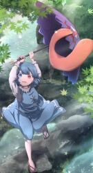 1girl arms_up blue_eyes blue_hair blue_skirt blue_vest commentary full_body geta heterochromia highres holding holding_umbrella kakera_(comona_base) leaf long_sleeves looking_at_viewer maple_leaf open_mouth outdoors purple_umbrella red_eyes short_hair skirt solo standing standing_on_one_leg tatara_kogasa tongue tongue_out touhou umbrella vest water